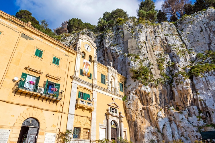 Palermo, Italy - May 11, 2018: Sanctuary of Santa Rosalia (Italian: Santuario di Santa Rosalia) in Palermo, Sicily, Italy. Located inside a ravine of rock, almost on the top of Mount Pellegrino
